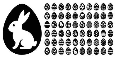 Black and White Easter Bunny and Decorative Patterned Egg Silhouette Set vector