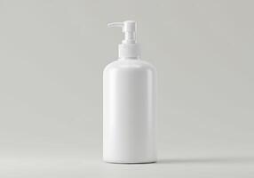 White plastic bottle with soap on a gray background photo