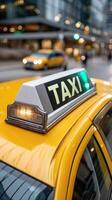 A taxi cab with the word taxi on the top photo