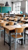 A classroom with wooden desks and chairs photo