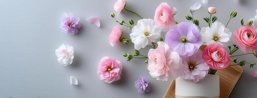 A vase filled with pink and white flowers photo