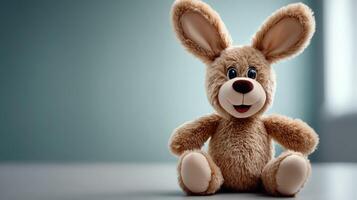 A stuffed animal sitting on a table photo