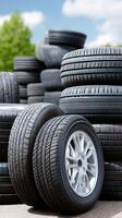 A pile of tires and a wheel photo