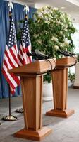 Two wooden podiums with american flags photo