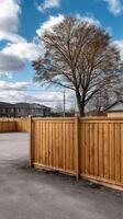 A wooden fence in a residential area photo
