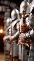 A group of men in armor standing in a line photo