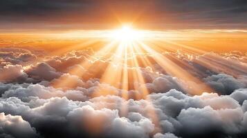 Sun shining through clouds over the sky photo