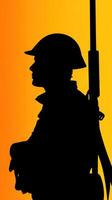 A silhouette of a soldier holding a rifle photo