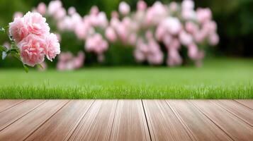 Wooden floor with pink flowers in the background photo