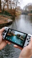 A person holding a smartphone with a camera on it photo