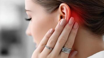 A woman with a red spot on her ear photo