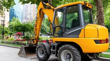 A yellow construction vehicle parked on the side of the road photo