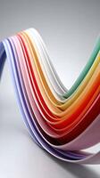 A rainbow colored wave of paper photo