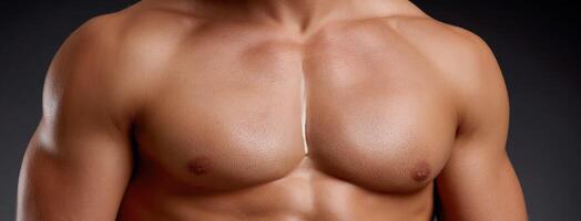 A man's chest with no shirt on photo