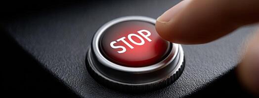 A person pushing a red button on a car photo