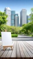 Empty easel on wooden table with cityscape background photo