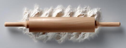 Rolling pin with flour on a white background photo
