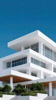 A modern white building with a large glass roof photo