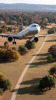 A plane flying over a field photo