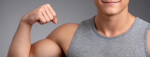 A man is showing off his muscles photo