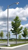 A street light is shown in a parking lot photo