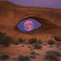 Majestic Full Moon Rising Through Natural Rock Arch at Twilight in the Vast Desert Landscape of American Southwest Beauty photo