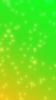 Glowing Particles on Green to Yellow Gradient Background, Vertical View video