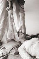 Wellness session with gentle stretching and relaxation practices in a serene indoor setting during daylight hours photo