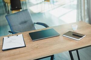 A modern workspace with a laptop, stylish notebook, and coffee, aimed at boosting productivity photo