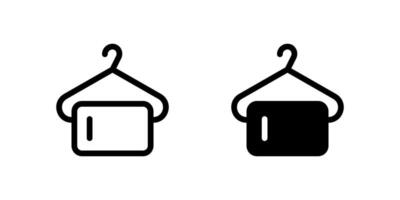 Towel Icon Set. A black icon of a towel, symbolizing hygiene or spa services in hospitality. vector
