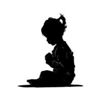 Silhouette of a child sitting and praying, shown in profile with a ponytail, on a plain white background, symbolizing faith and innocence vector