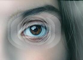 Close-up view of an eye showcasing vibrant colors and digital graphics representing technology in vision at a studio photo