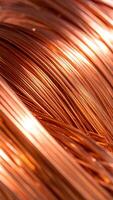 Copper Wires Glisten Under Bright Light Showcasing Intricate Textures and Hues in a Close-Up View photo