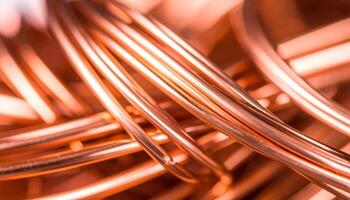Close up View of Shapely Copper Wires Showcasing Intricate Details and Rich Color Variations in an Industrial Setting photo
