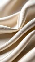 Textured Cream Fabric Drapes Elegantly to Create a Soft and Inviting Aesthetic With Delicate Folds photo