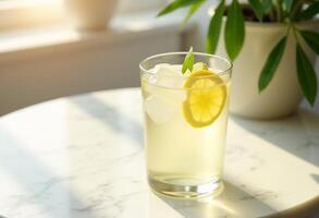 Fresh Lemon Water by the Window with Greenery photo