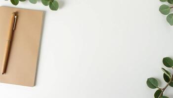 Notebook with lavender and greenery in soft natural light. photo
