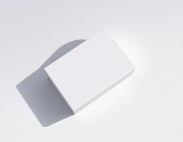 An empty white box sitting on a table photo