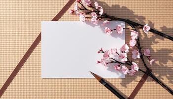 A blank piece of paper and a pair of scissors on a table photo