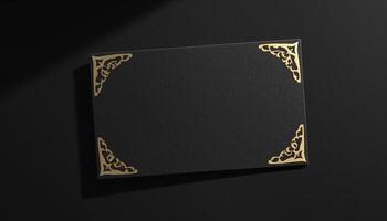 Black and gold frame with gold border on black background photo