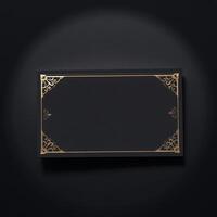 Black and gold frame with golden border on a black background photo