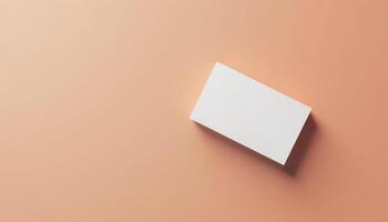 A white square on a peach background photo