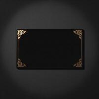 Black and gold frame on a black background photo