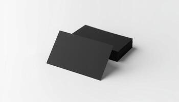 A black square card on a white surface photo