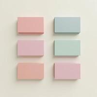 Four different colored boxes on a white surface photo