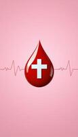 Blood drop with cross on a pink background photo