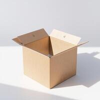 A cardboard box is open on a white surface photo