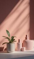 Pink vases and plant on a shelf photo