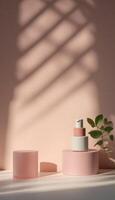 Pink and white containers sit on a table photo
