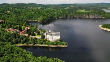 Aerial view of chateau Orlik and Vltava river in May 2025 in Czechia video